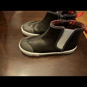 Never worn kid outgrew them too fast!!! Perfect for a rainy school day!